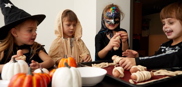 Kids making Halloween foods