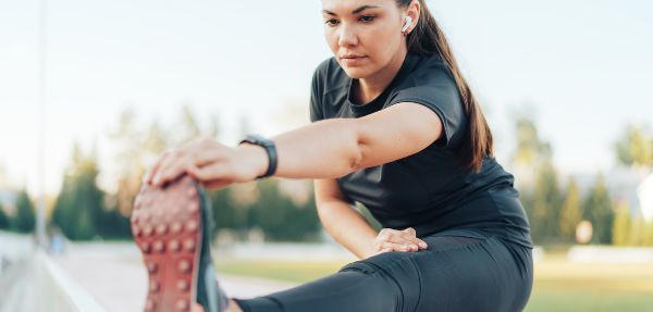 Sportswoman Stretching