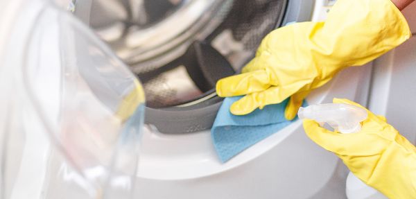 How to clean a washing machine with vinegar and baking soda