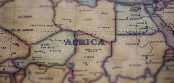 The word 'Africa' on a small section of the world map