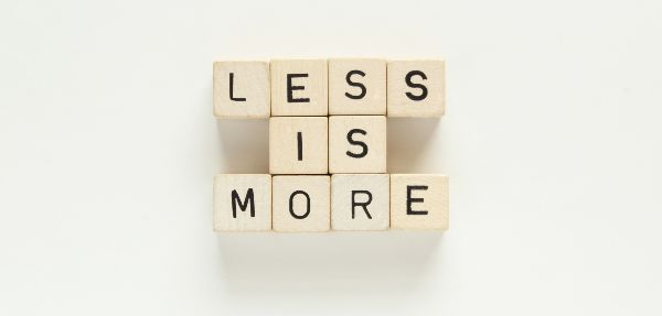 Blocks spelling out "Less is More"