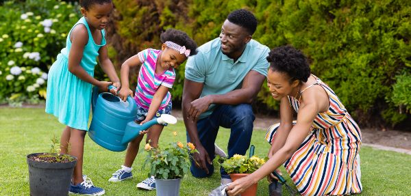 Family doing gardening together.