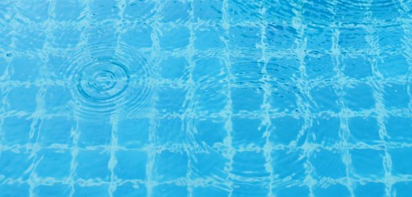 Raindrops on a swimming pool.