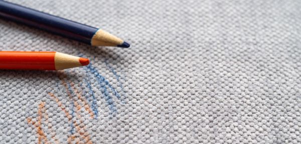 Drawn fabric on the couch with colored pencils.