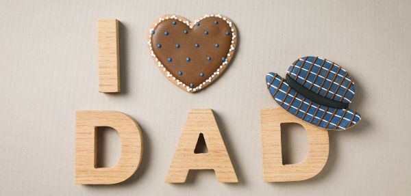 "I heart Dad" spelt out with wooden block letters