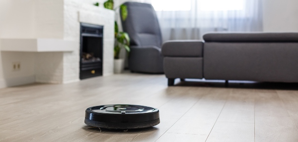 Robot vacuum cleaning a wooden floor