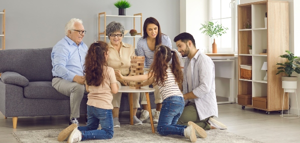 Family playing Jenga together