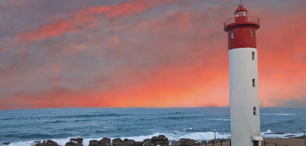 Photograph of the lighthouse in Umhlanga, Durban, with the ocean in the background